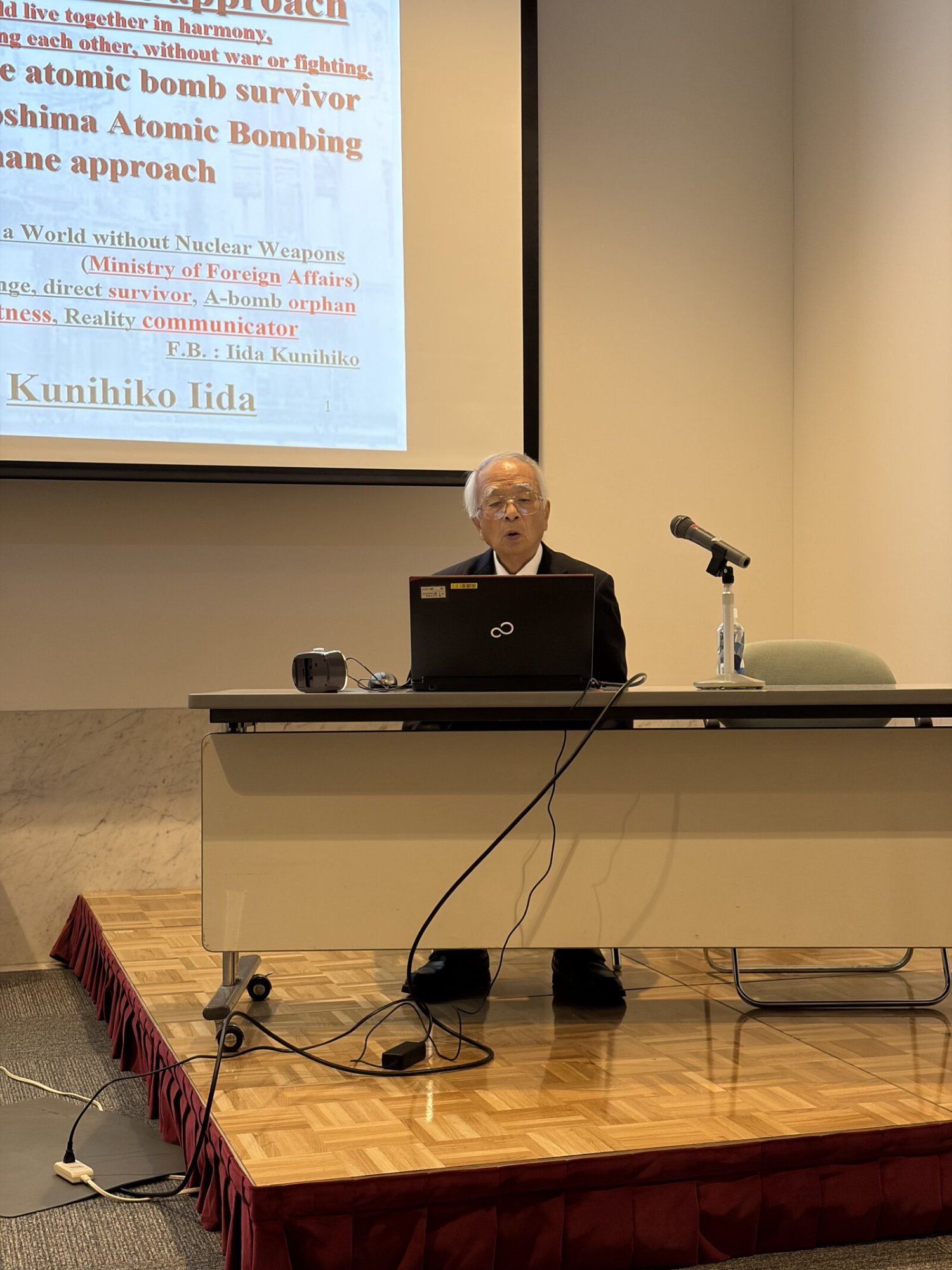 Iida sharing testimony